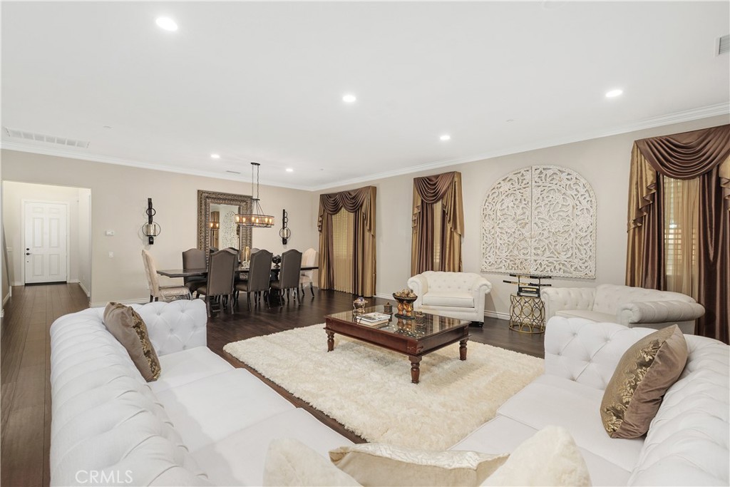 24128 Deputy Way Menifee, CA 92584 - Photo 3 of 34 a living room with furniture and wooden floor