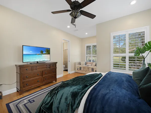 a bathroom with a toilet and a bathtub