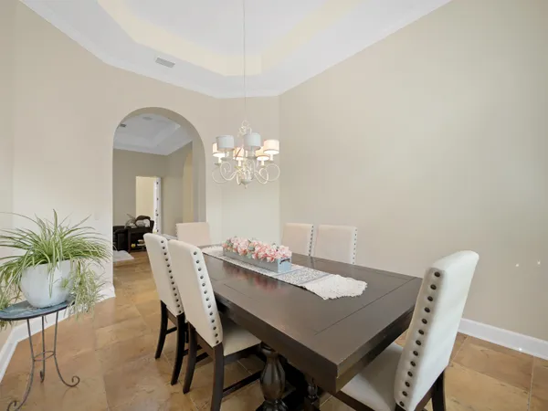 a view of a kitchen and dining room