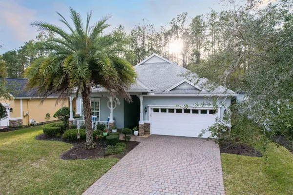 a view of house with outdoor space and entrance