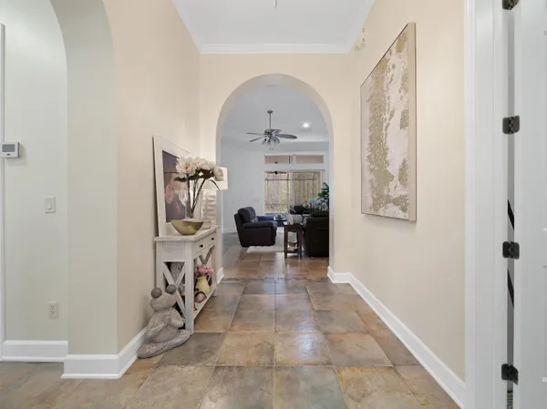 a view of entryway with livingroom