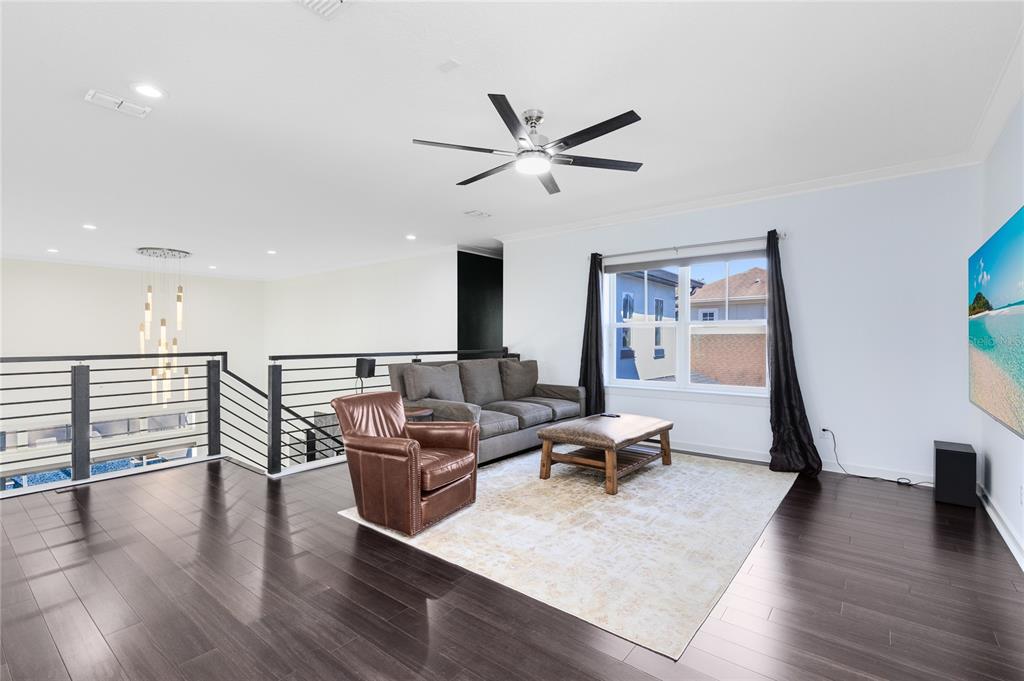 12664 Banting Terrace Orlando, FL 32827 - Photo 31 of 79 a living room with furniture