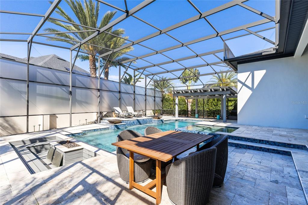 12664 Banting Terrace Orlando, FL 32827 - Photo 46 of 79 a view of a backyard with sitting area