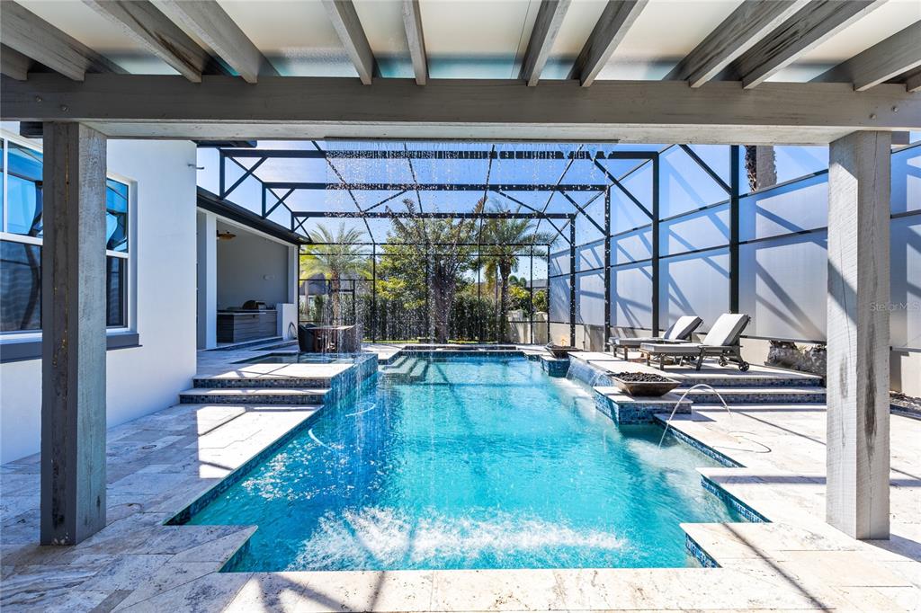 12664 Banting Terrace Orlando, FL 32827 - Photo 48 of 79 a view of swimming pool with a couches and lounge chair