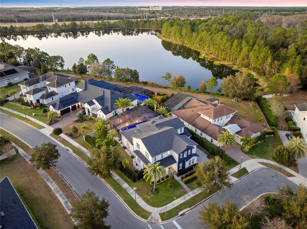 12664 Banting Terrace Orlando, FL 32827 - Photo 59 of 79 an aerial view of house with yard and ocean view