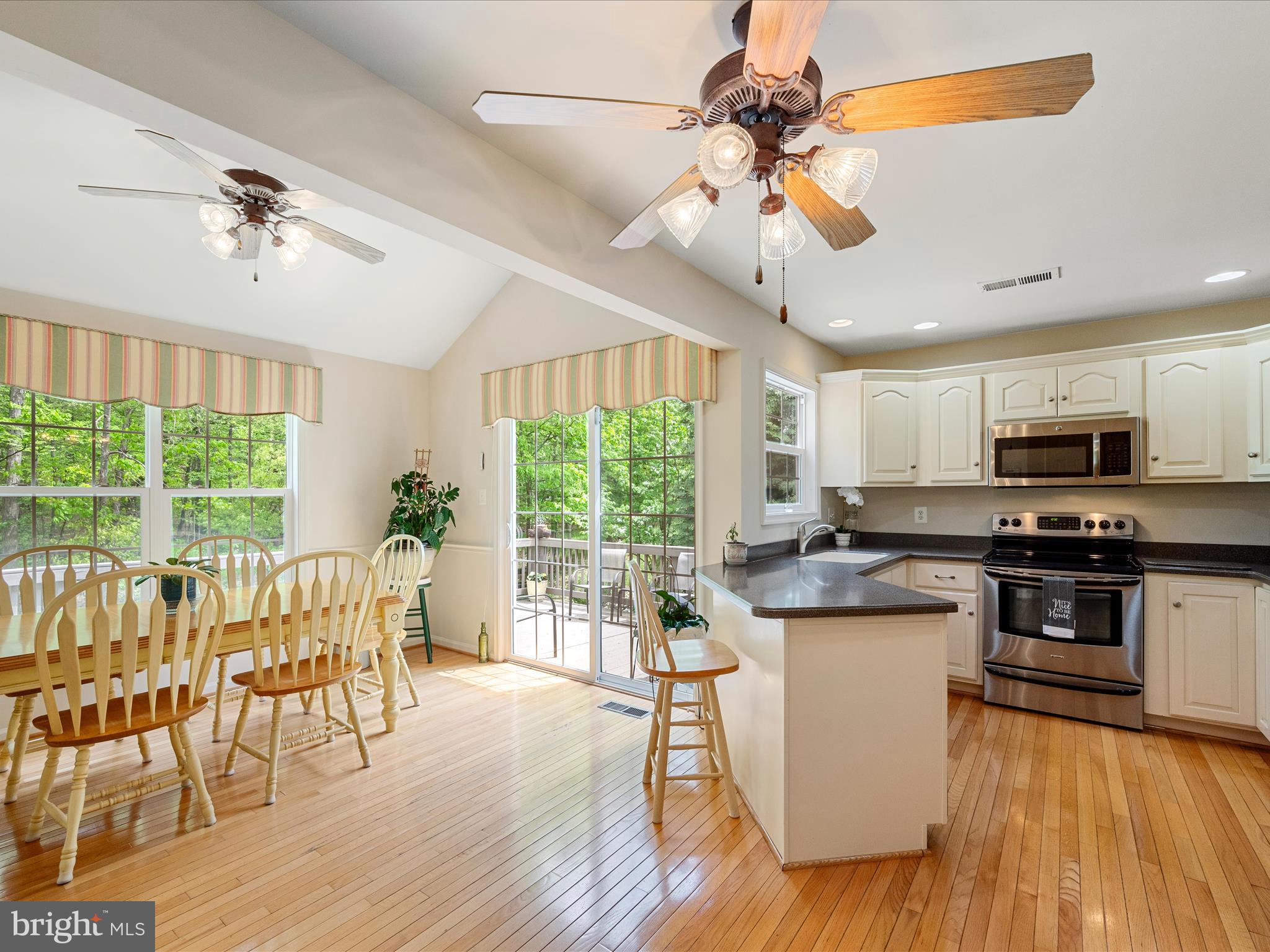 108 Eagle Drive Cross Junction, VA 22625 - Photo 15 of 61 a view of a dining room with furniture window and wooden floor