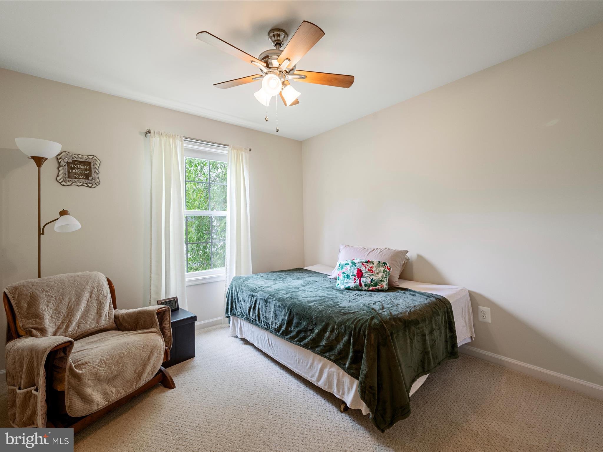 108 Eagle Drive Cross Junction, VA 22625 - Photo 23 of 61 a bedroom with bed and a chandelier