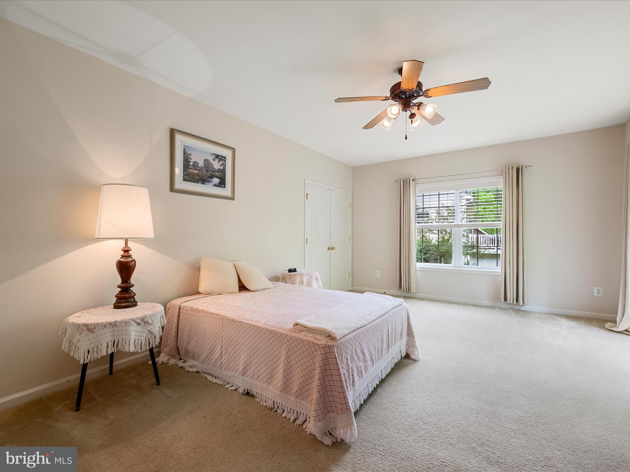 108 Eagle Drive Cross Junction, VA 22625 - Photo 30 of 61 a bedroom with a bed and a chandelier