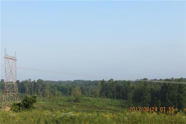 28 Hwy 49 Tennessee Ridge Tennessee Ridge, TN 37178 - Photo 3 of 16 a view of a field of grass and mountain view