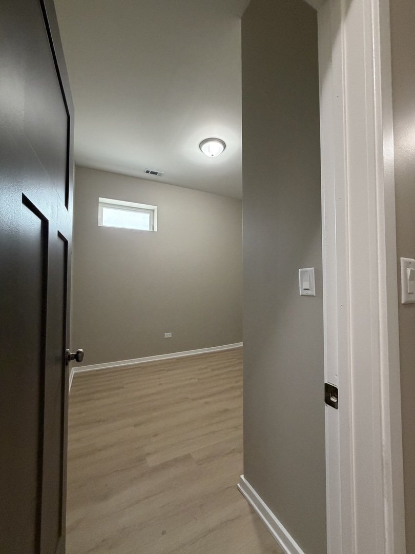 22 North Pulaski Road, Unit 1R Chicago, IL 60624 - Photo 19 of 22 a view of an empty room
