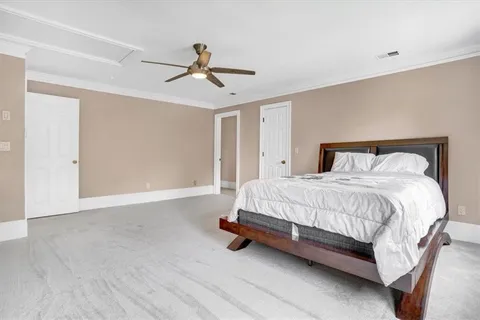 a bathroom with a granite countertop sink and mirror