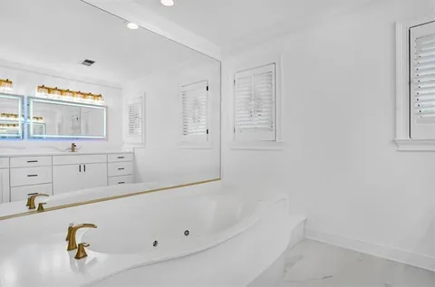 an empty room with furniture and toys