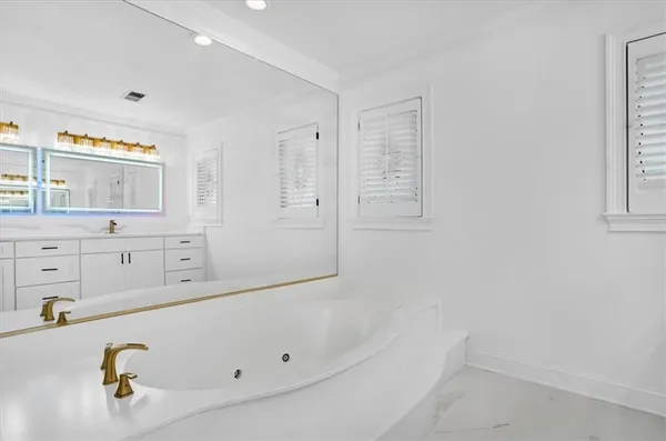 an empty room with furniture and toys