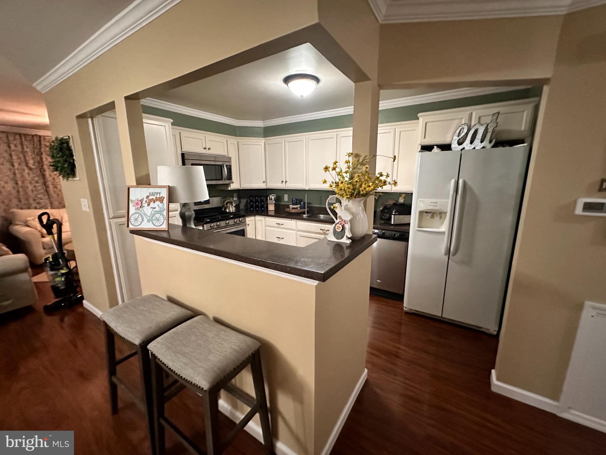 314 Valleybrook Drive Lancaster, PA 17601 - Photo 6 of 19 a kitchen with sink a refrigerator and wooden floor