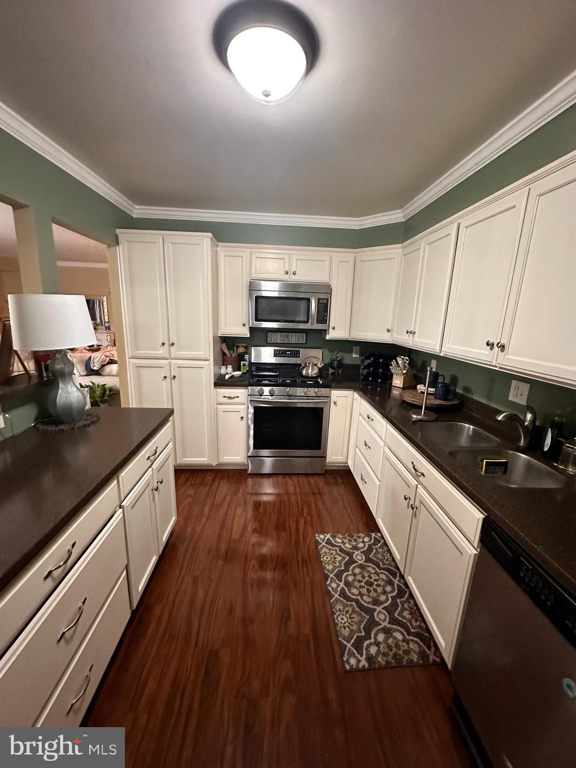 314 Valleybrook Drive Lancaster, PA 17601 - Photo 7 of 19 a kitchen with granite countertop a stove sink and cabinets