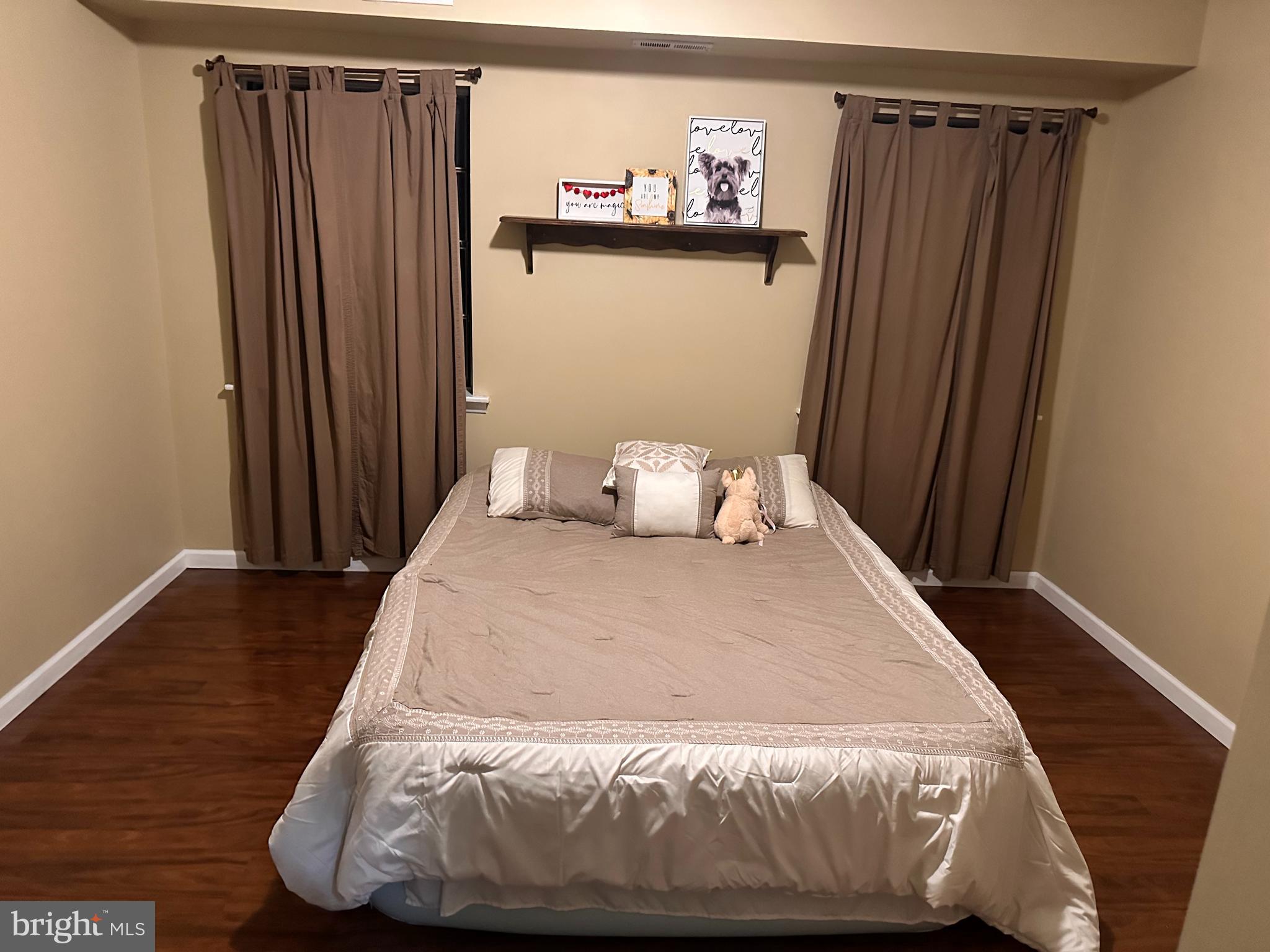 314 Valleybrook Drive Lancaster, PA 17601 - Photo 9 of 19 a bed sitting in a bedroom next to a cabinet