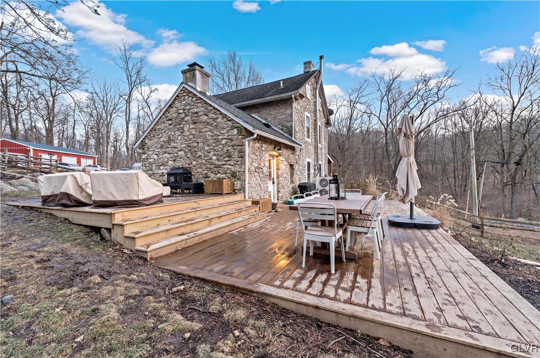 90 Crow Hill Road Barto, PA 19504 - Photo 32 of 41 a view of a house with backyard and sitting area