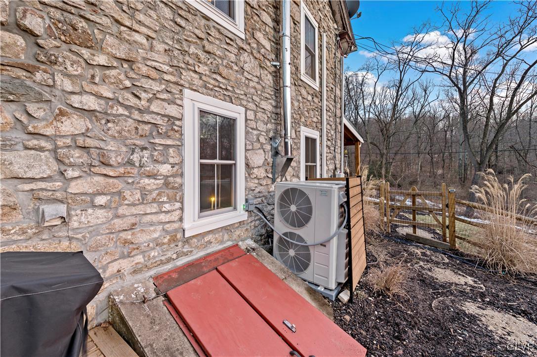 90 Crow Hill Road Barto, PA 19504 - Photo 33 of 41 a wooden bench sitting in front of a building