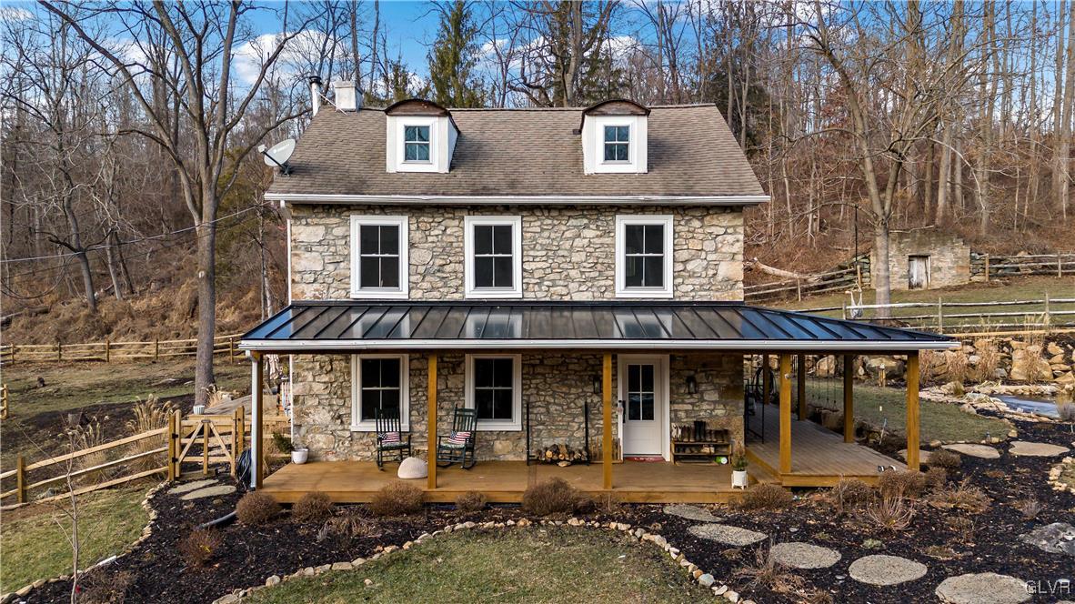 90 Crow Hill Road Barto, PA 19504 - Photo 4 of 41 a front view of a house with patio