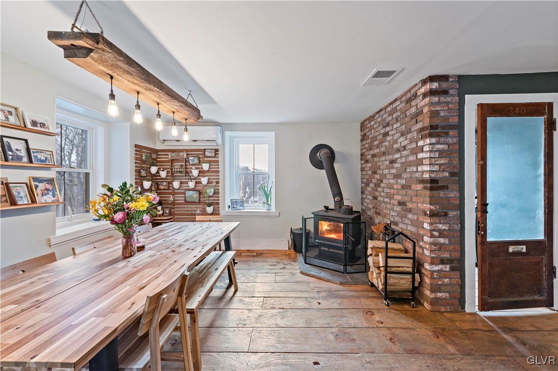 90 Crow Hill Road Barto, PA 19504 - Photo 10 of 41 a view of a dining room with furniture and a potted plant