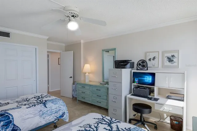 a kitchen with counter top space and living room
