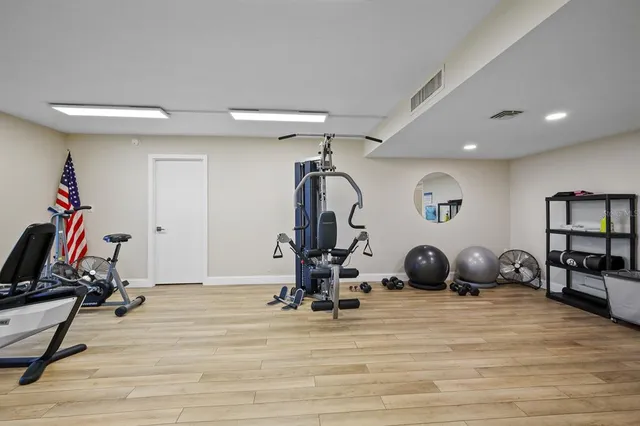 a view of a room with gym equipment