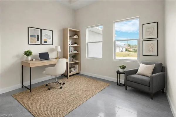 a living room with furniture rug and window