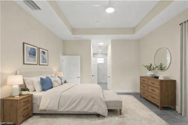 an empty room with large closet and mirror