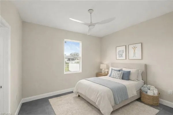 an empty room with a bench and closet