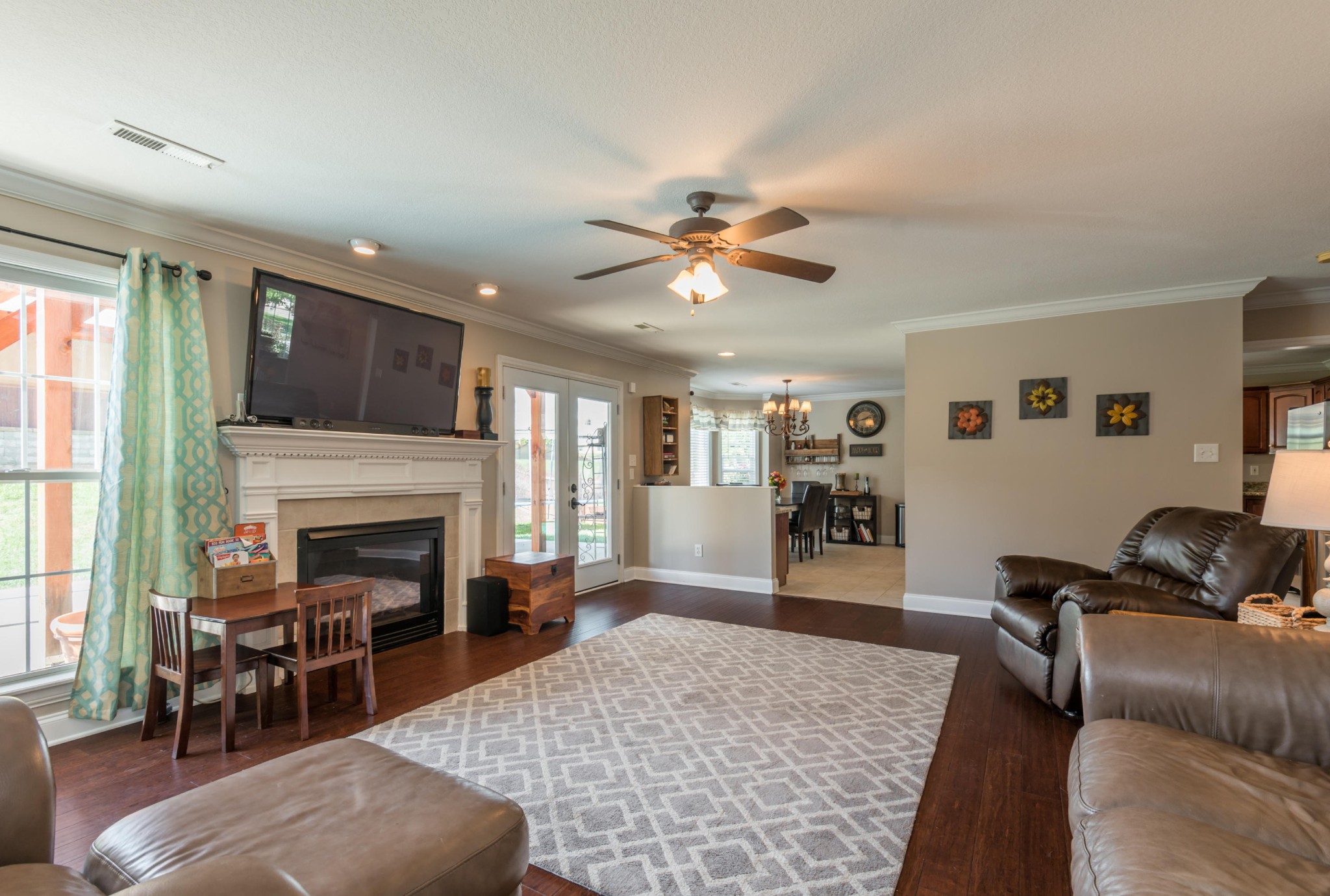 12665 Clear Ridge Road Knoxville, TN 37922 - Photo 16 of 39 a living room with furniture and a fireplace