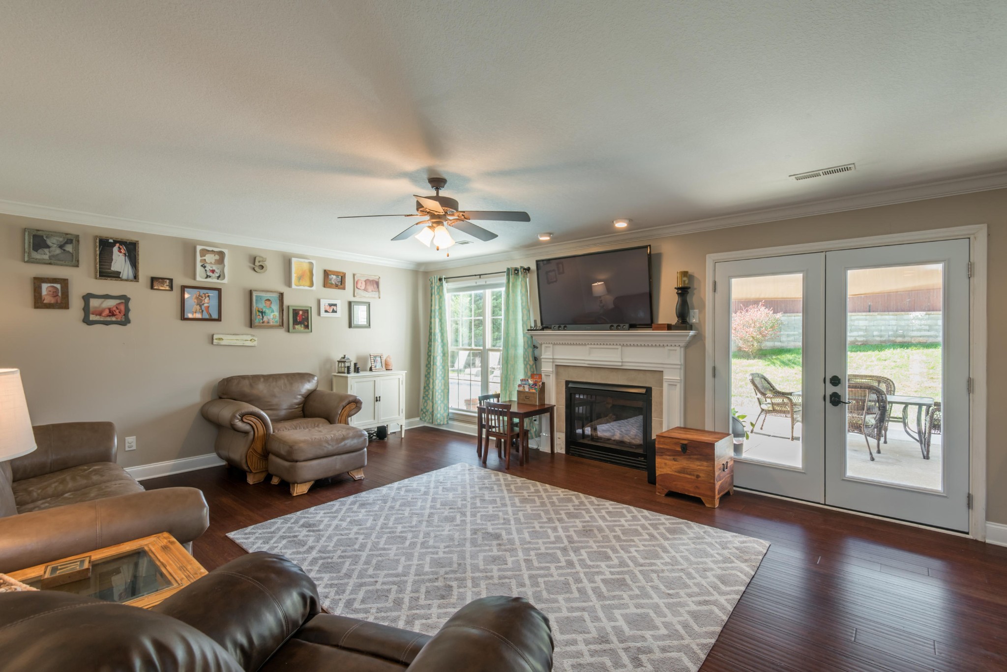 12665 Clear Ridge Road Knoxville, TN 37922 - Photo 17 of 39 a living room with furniture and a fireplace