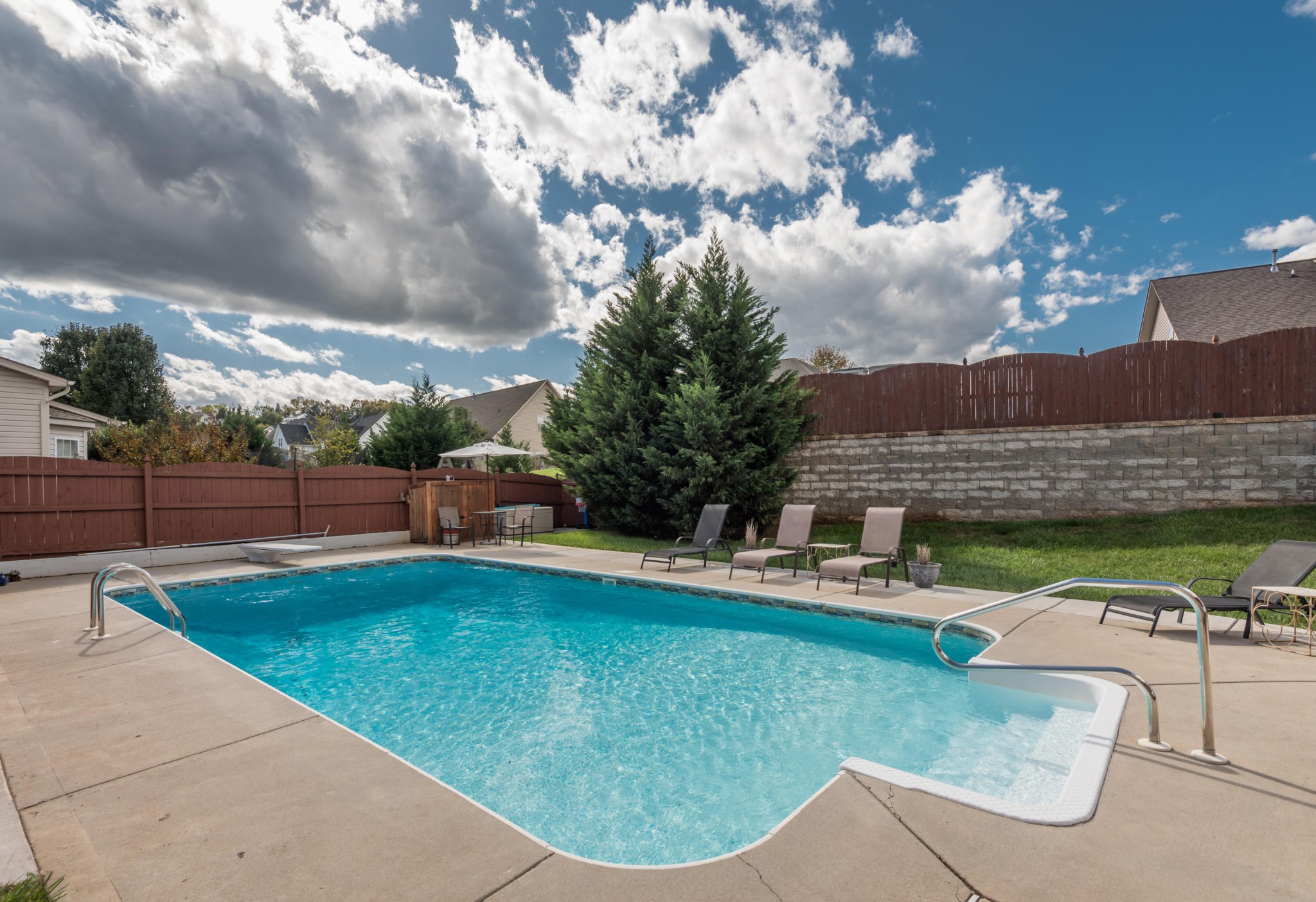 12665 Clear Ridge Road Knoxville, TN 37922 - Photo 20 of 39 a view of a swimming pool with a patio