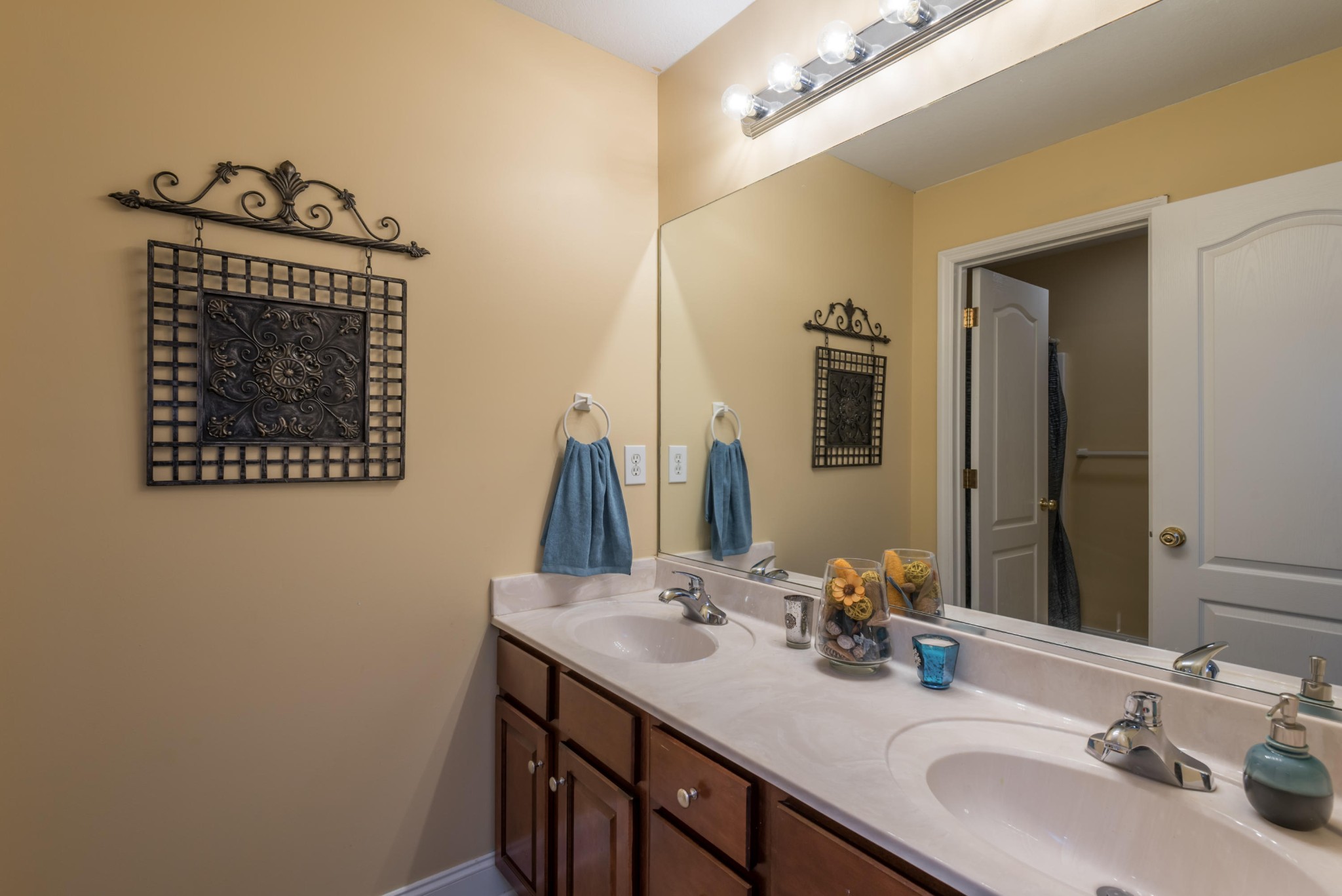 12665 Clear Ridge Road Knoxville, TN 37922 - Photo 30 of 39 a bathroom with a sink a mirror and a vanity