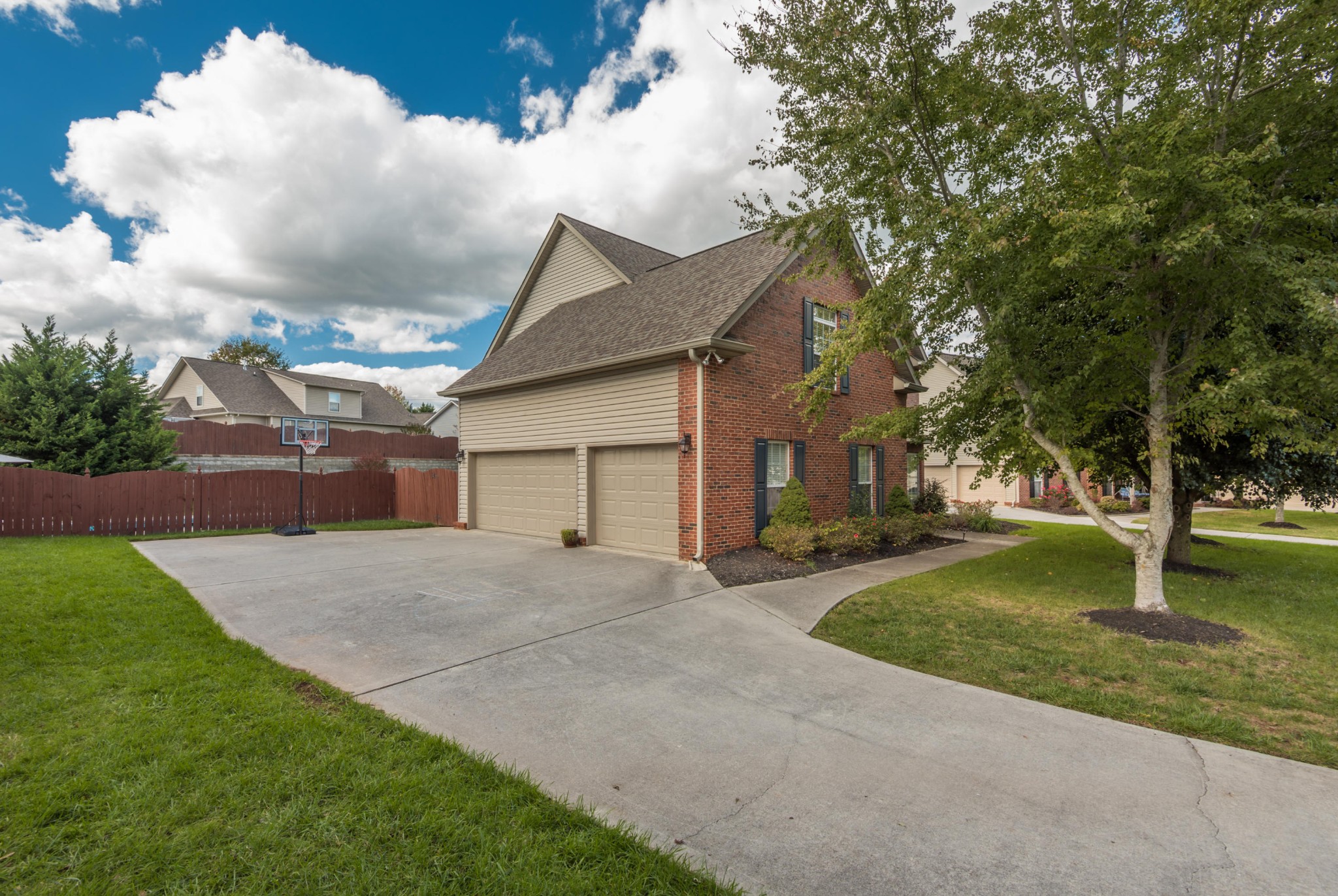 12665 Clear Ridge Road Knoxville, TN 37922 - Photo 3 of 39 a front view of a house with garden