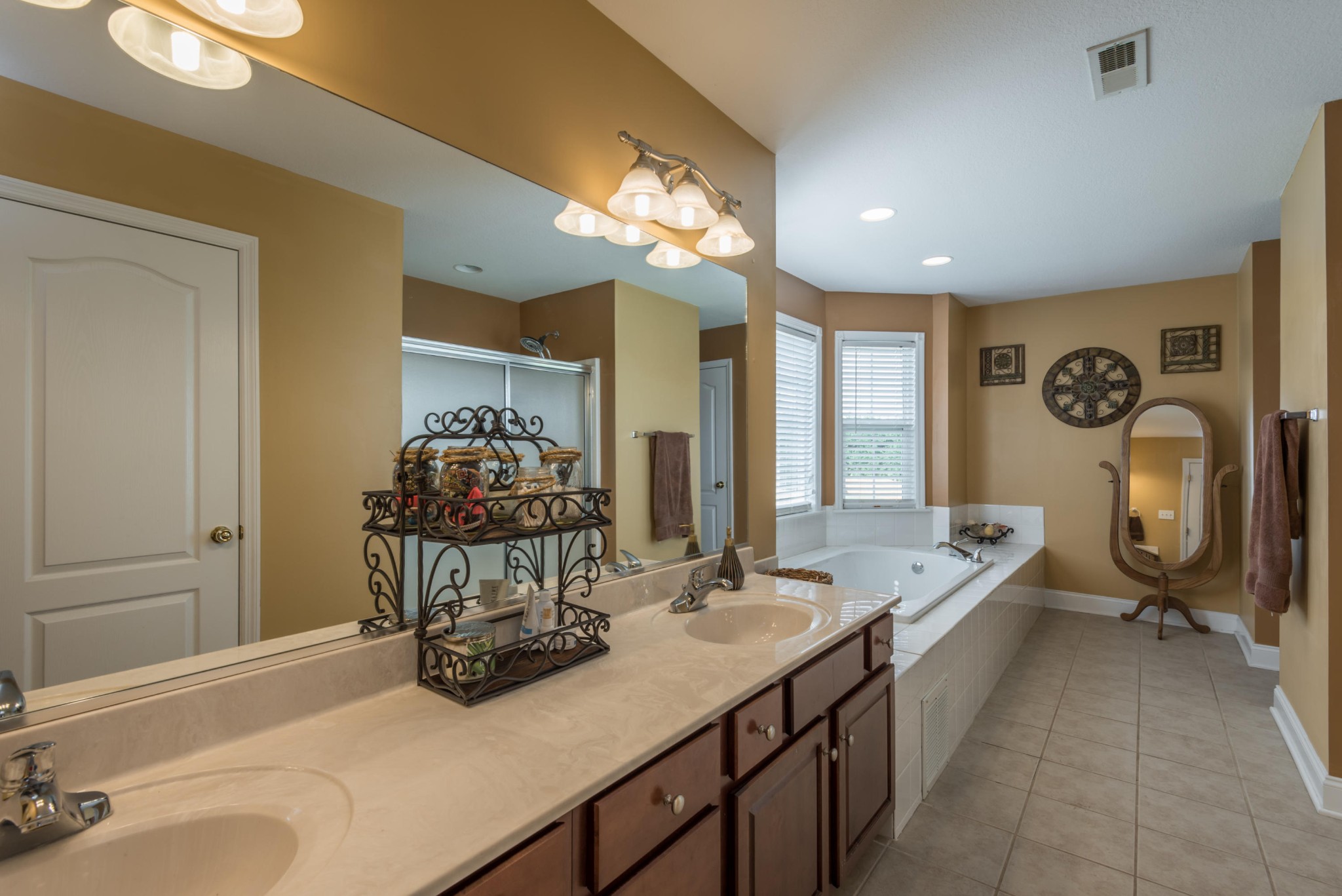 12665 Clear Ridge Road Knoxville, TN 37922 - Photo 31 of 39 a view of a bathroom with dual sinks