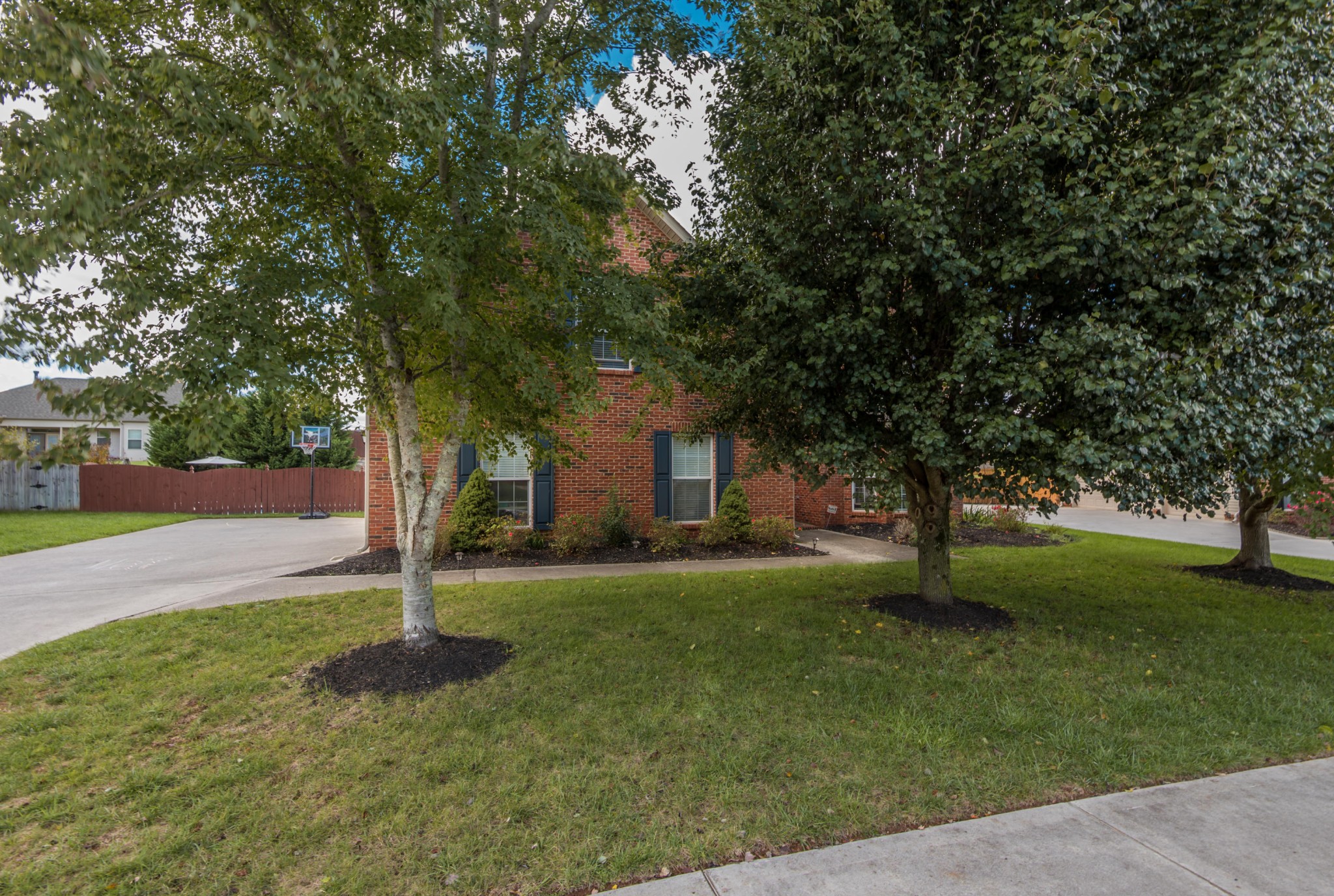 12665 Clear Ridge Road Knoxville, TN 37922 - Photo 38 of 39 a tree in the middle of a garden