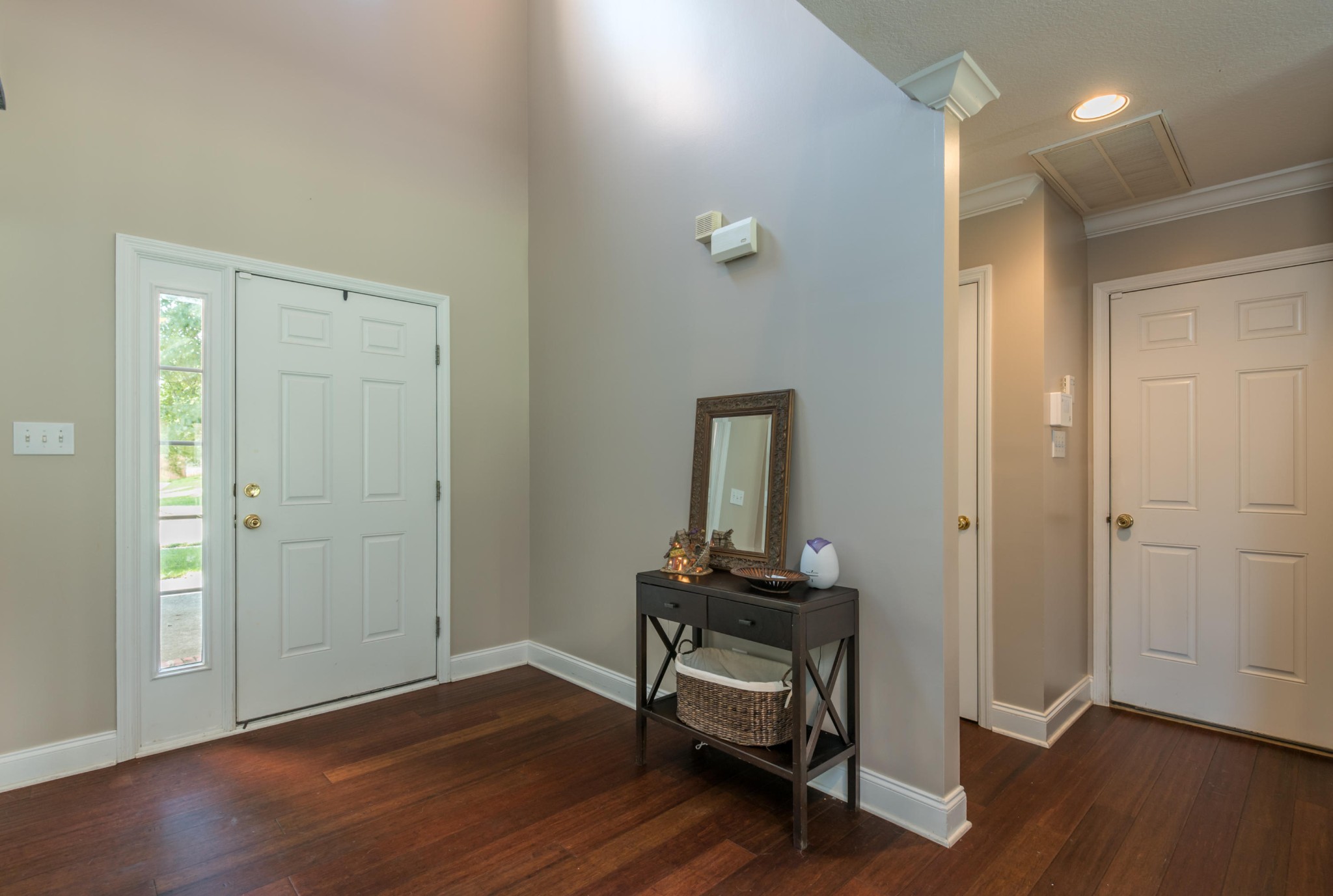 12665 Clear Ridge Road Knoxville, TN 37922 - Photo 4 of 39 an empty room with wooden floor and windows