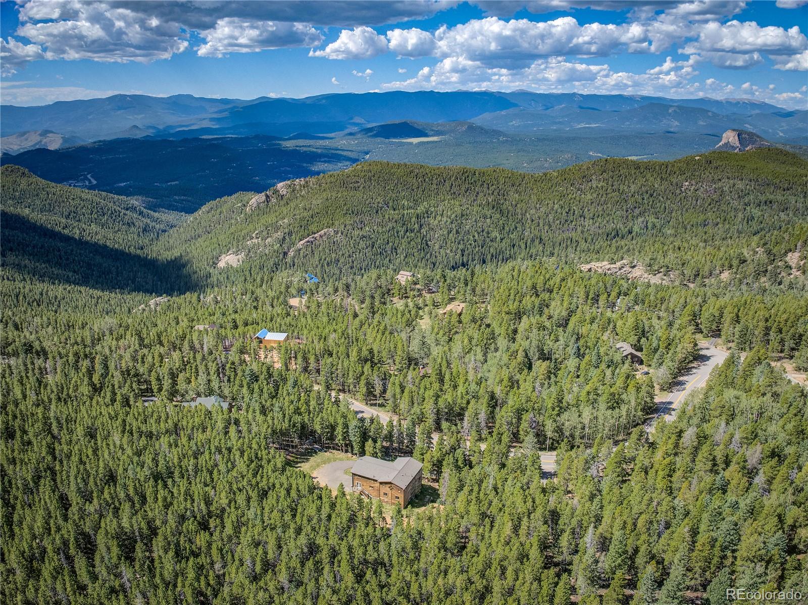 a view of ocean with a yard