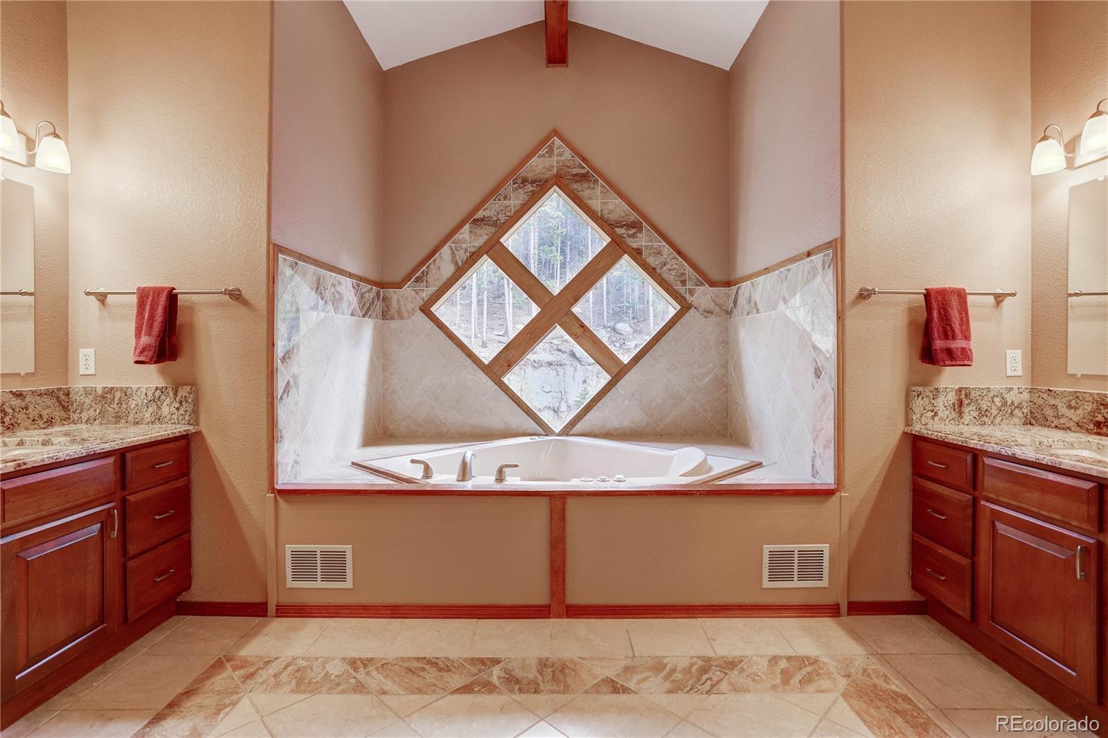 10922 Conifer Mountain Road Conifer, CO 80433 - Photo 25 of 37 a view of cabinets