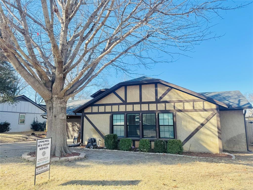 1109 Simpson Terrace Bedford, TX 76021 - Photo 11 of 39 a view of house with a yard