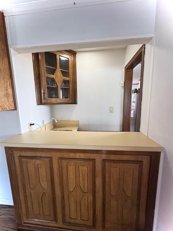 1109 Simpson Terrace Bedford, TX 76021 - Photo 12 of 39 a bathroom with a sink a mirror and a window