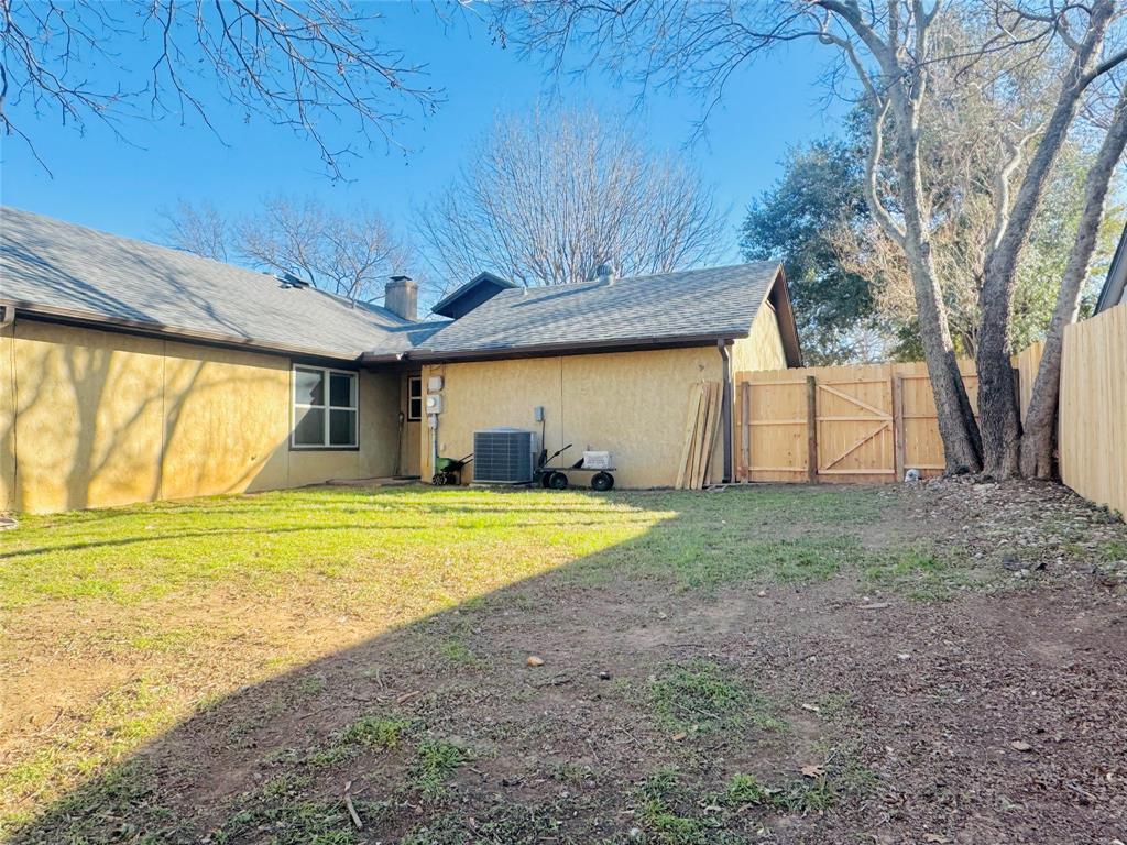 1109 Simpson Terrace Bedford, TX 76021 - Photo 13 of 39 a house view with a backyard space