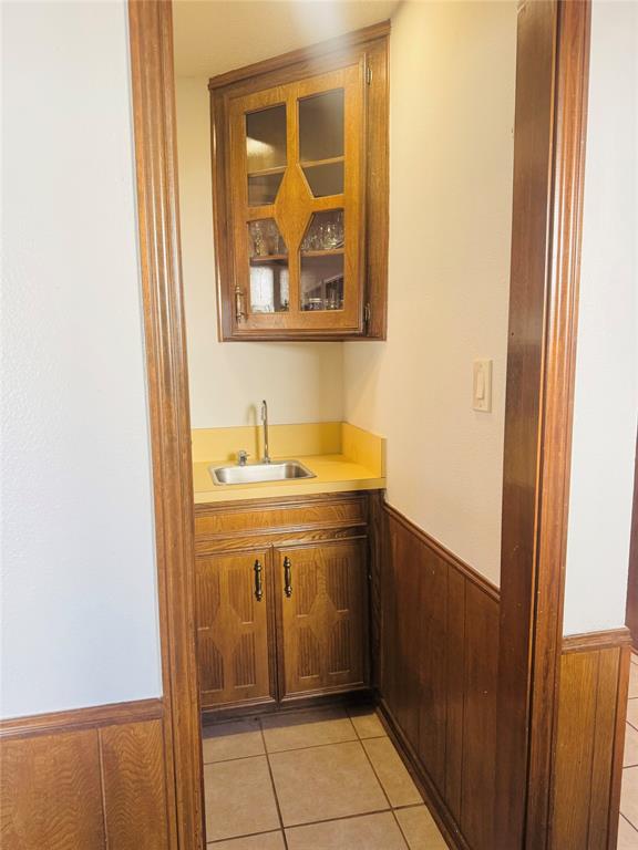 1109 Simpson Terrace Bedford, TX 76021 - Photo 35 of 39 a bathroom with a sink and a mirror