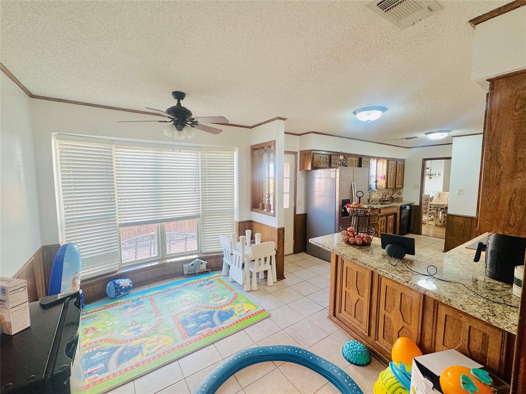 1109 Simpson Terrace Bedford, TX 76021 - Photo 5 of 39 a very nice looking dining room with furniture
