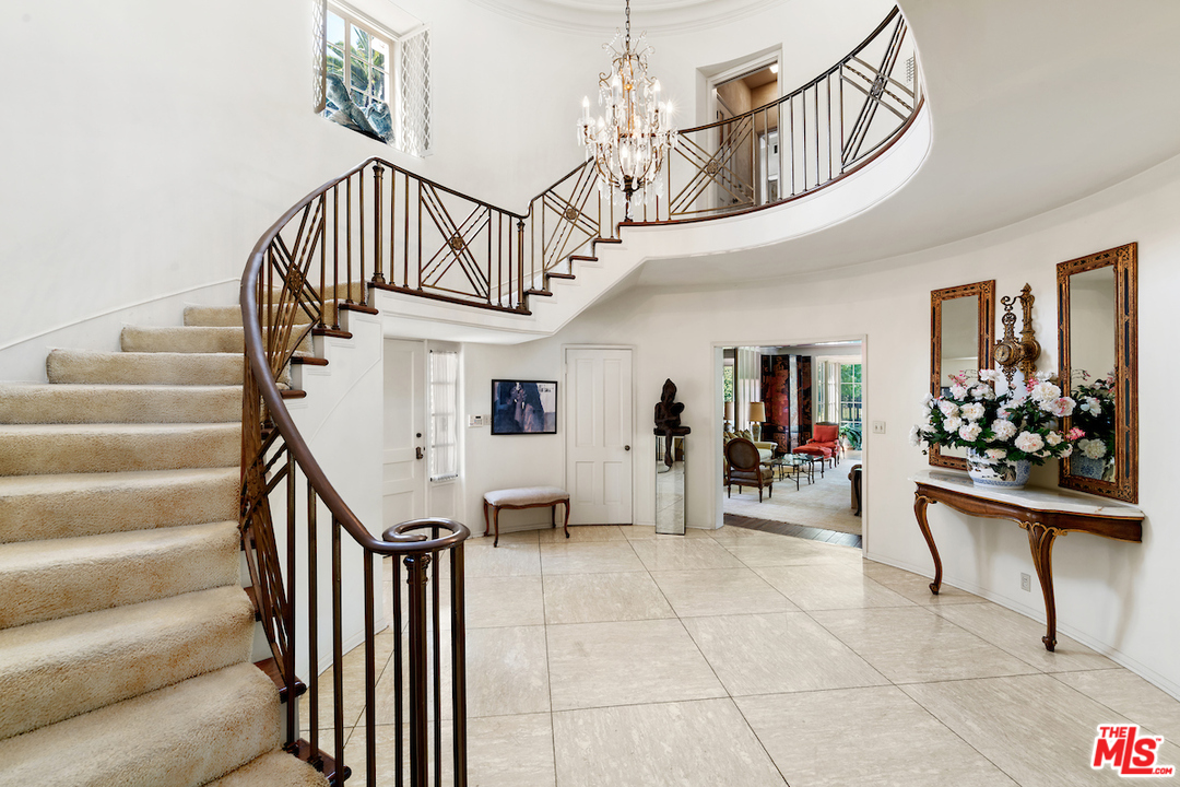 300 South Rockingham Avenue Los Angeles, CA 90049 - Photo 6 of 49 a view of entryway livingroom and hall