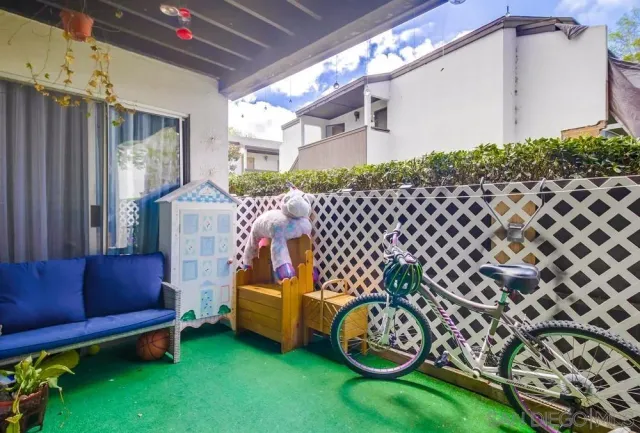 a view of a porch with furniture