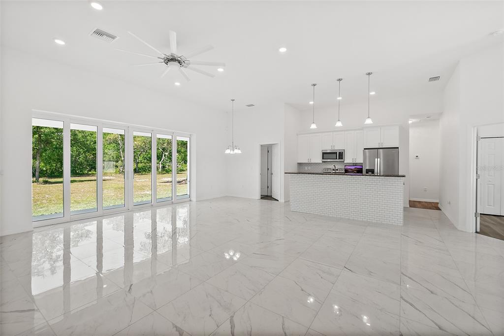 1370 Buckles Road Pierson, FL 32180 - Photo 4 of 57 a view of a kitchen with a sink and an oven