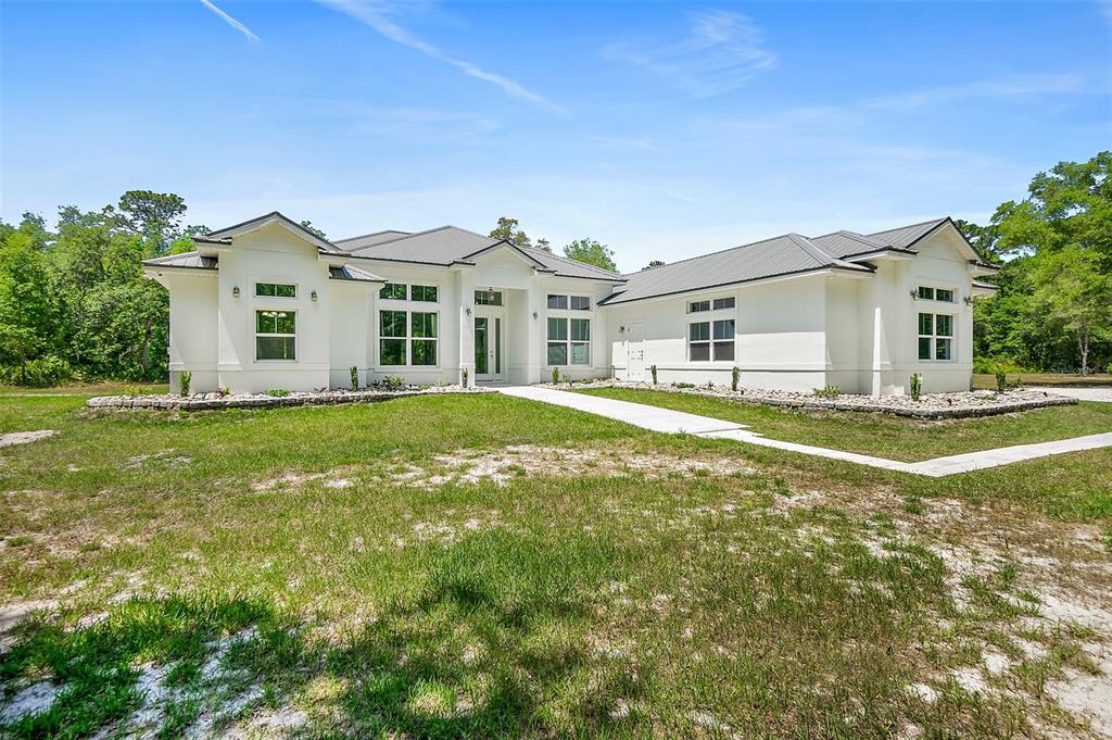 1370 Buckles Road Pierson, FL 32180 - Photo 57 of 57 a front view of a house with a yard