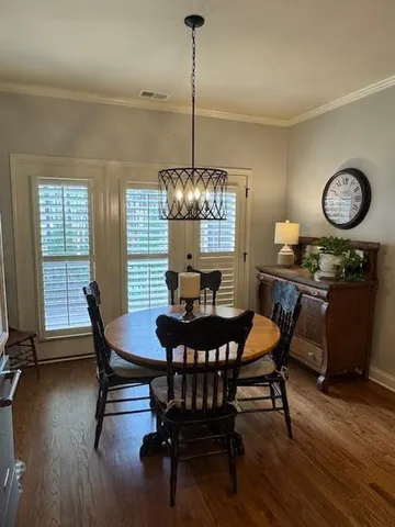 a spacious bathroom with a double vanity sink and a mirror