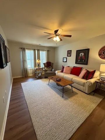 a utility room with sink dryer and washer